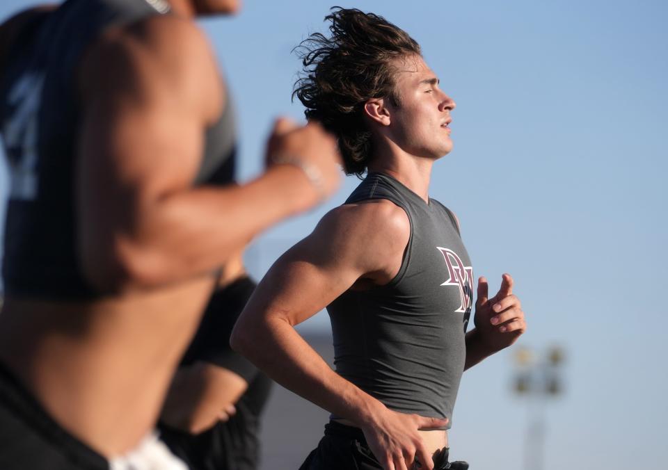 Jack Freeburg practices with his teammates at the Desert Mountain High football field in Scottsdale on May 3, 2023.