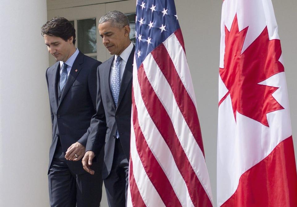 President Barack Obama and Prime Minister Justin Trudeau walk out together before their joint news conference, Thursday, March 10, 2016, in the Rose Garden of the White House in Washington. (AP Photo/Pablo Martinez Monsivais)