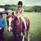 Alexa Chung was into the ladylike look even when she was a child - here she is on her horse, aged eight.