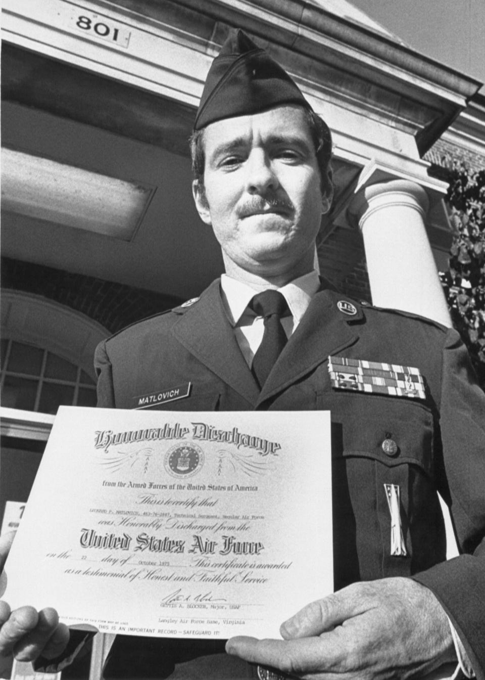Leonard Matlovich holds his honorable discharge papers