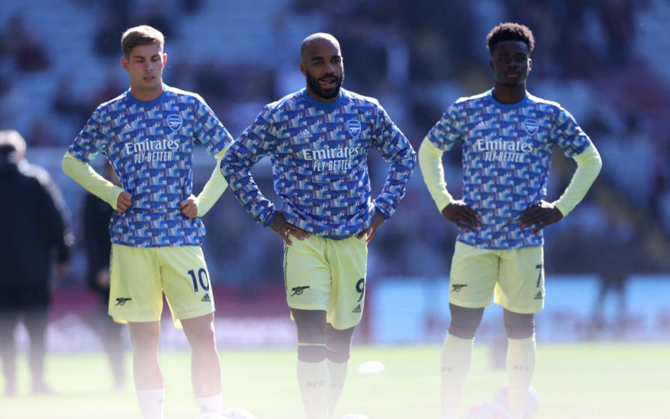 Alexandre Lacazette, Emile Smith Rowe, Bukayo Saka during the warm up - Action Images via Reuters