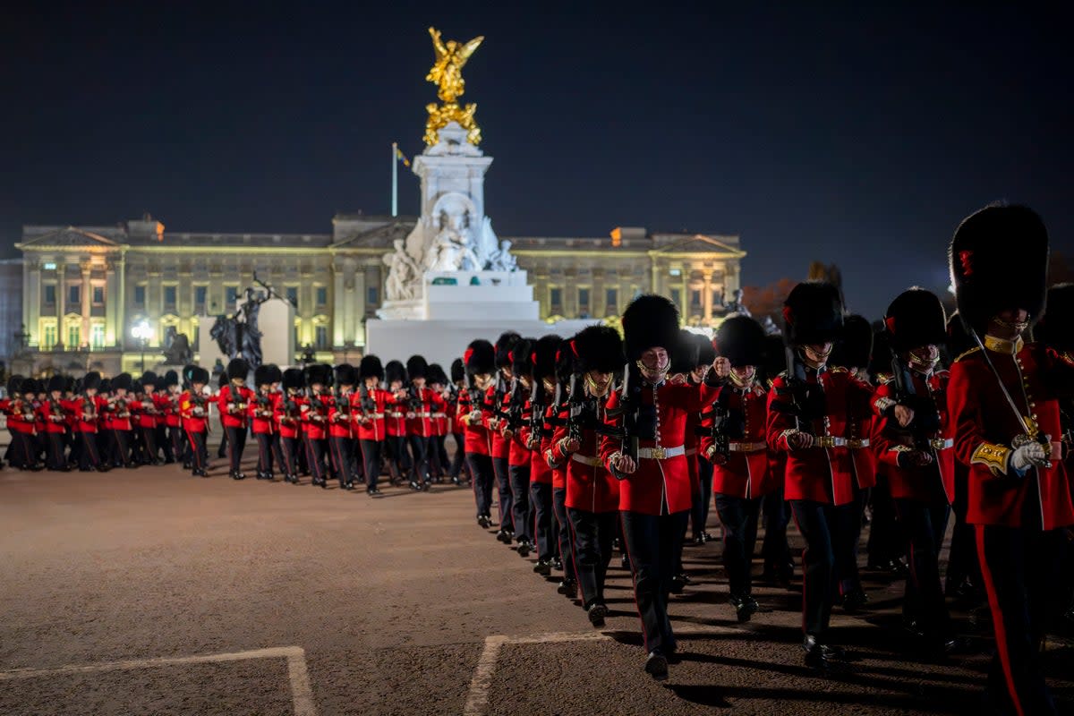 Members of the military march near Buckingham Palace in the coronation rehearsal (Copyright 2023 The Associated Press. All rights reserved)