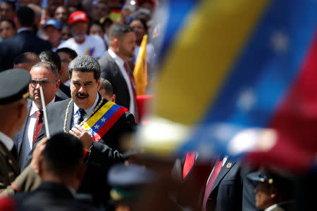 Venezuela's President Nicolas Maduro arrives for a special session of the National Constituent Assembly to present his annual state of the nation in Caracas, Venezuela January 14, 2019. REUTERS/Carlos Garcia Rawlins