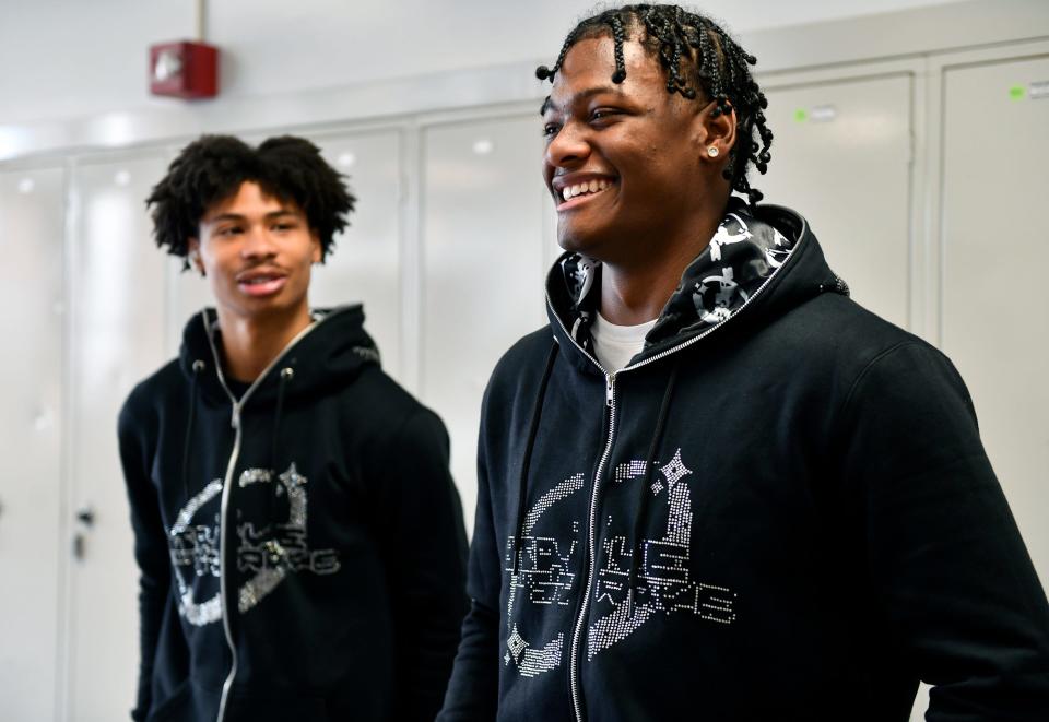 Vineland High School senior Antwain Rivera, right, shows off his latest Strive or Starve hoodie design with his friend Daeshaun Winchester on Thursday, May 12, 2022.