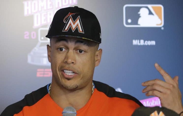 Giancarlo Stanton is quickly losing his patience with the Marlins. (AP)