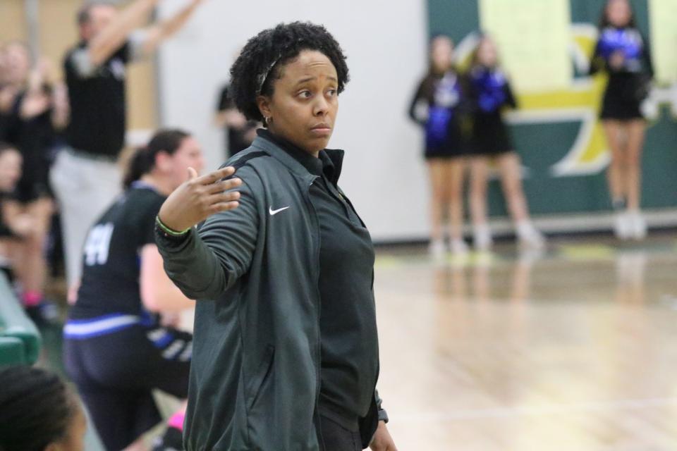 Hillsboro coach Cherish Stringfield motions for a player to come into the game during the second quarter of their Region 6-4A tournament semifinal against Nolensville Monday, Feb. 27, 2023 at Hillsboro High School in Nashville, Tennessee.