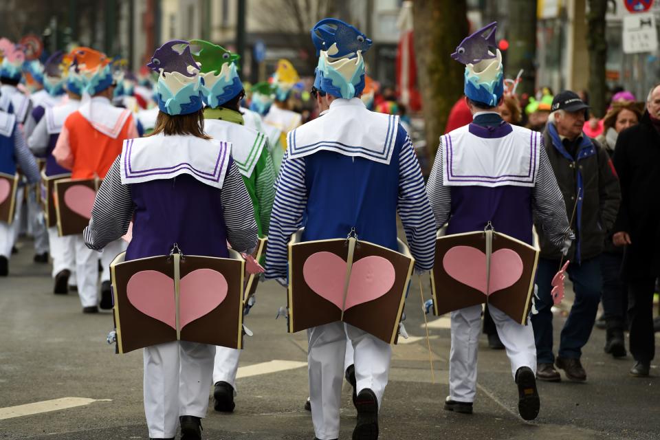 <p>Dressed-up people take part in a carnival parade on Rose Monday on Feb. 12, 2018 in Duesseldorf, western Germany. (Photo: Patrik Stollarz/Getty Images) </p>