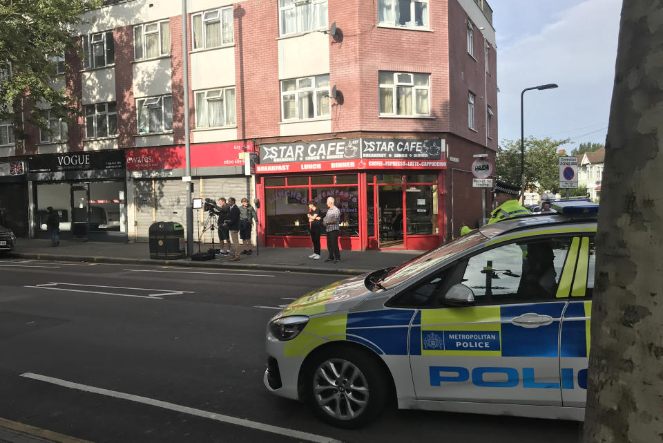 Police at the scene in Leyton, east London, where a police officer was stabbed shortly before midnight after attempting to stop a van.