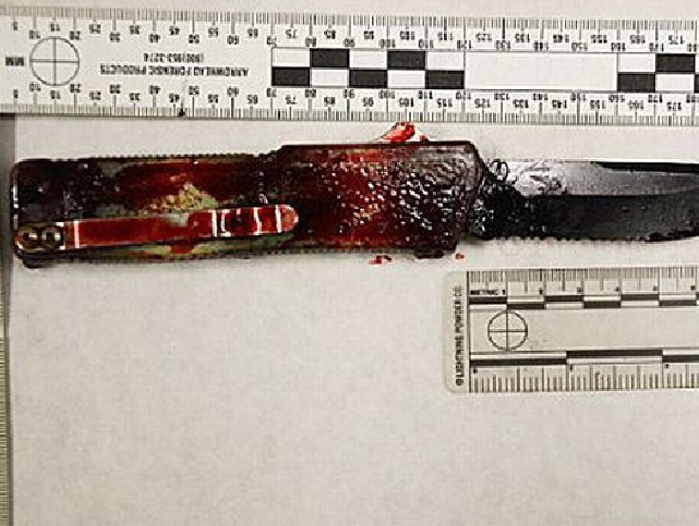 A blood covered knife from the crime scene. Photo: Martin County Police.