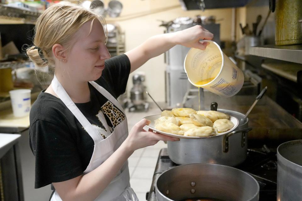 Jill Mlinar, Polonez sous chef, prepares pierogi for the buffet at Polonez Restaurant in St. Francis.