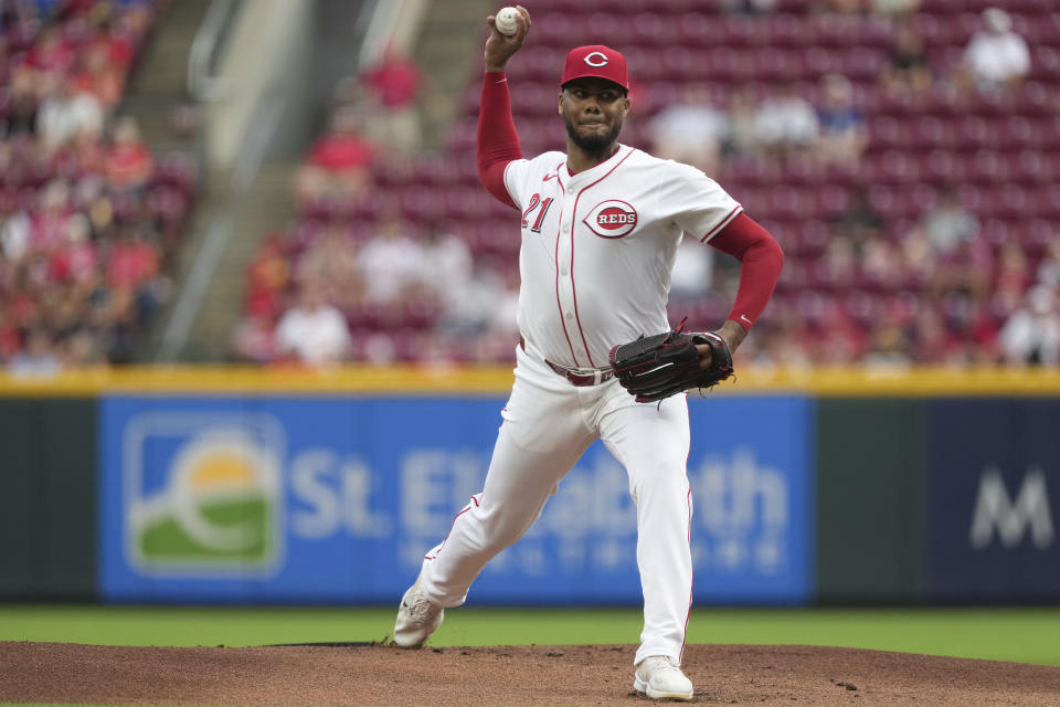 Cincinnati Reds' Hunter Greene delivers a pitch during the first inning of a baseball game against the St. Louis Cardinals, Tuesday, Aug. 13, 2024, in Cincinnati. (AP Photo/Kareem Elgazzar)