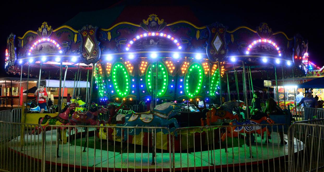 Attendees enjoy the Merry-Go-Round during the 2019 Etowah County Fair in Attalla. This year's event starts Tuesday and runs through Sunday.
