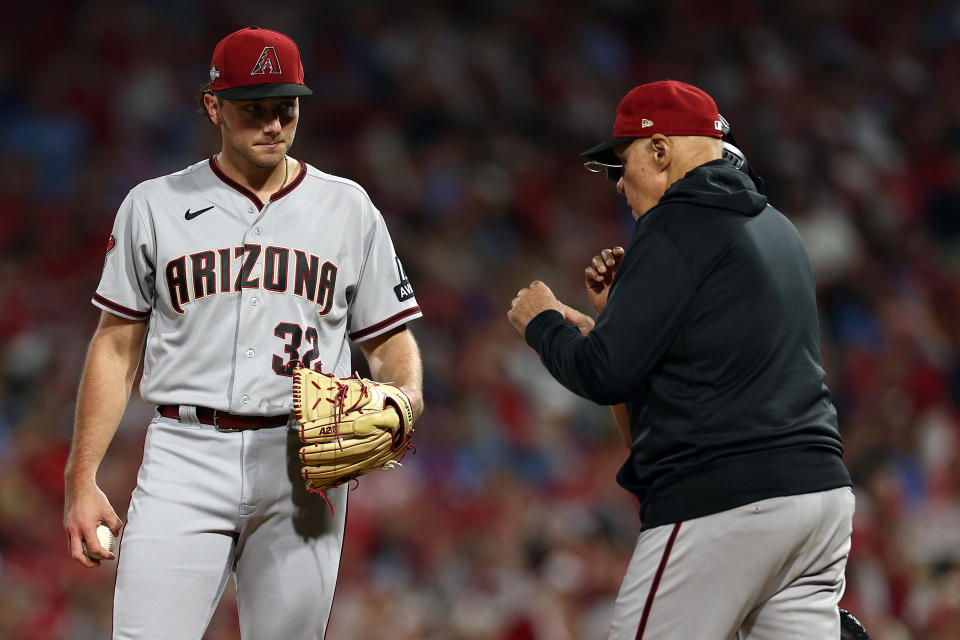 With the help of pitching coach Brent Strom (right), rookie starter Brandon Pfaadt has become a formidable No. 3 for the Diamondbacks. (Photo by Elsa/Getty Images)