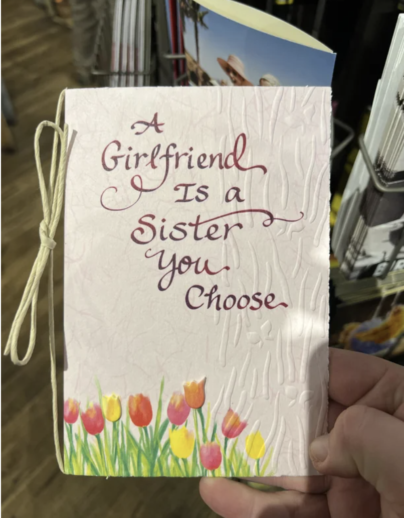 The card says "a girlfriend is a sister you choose"