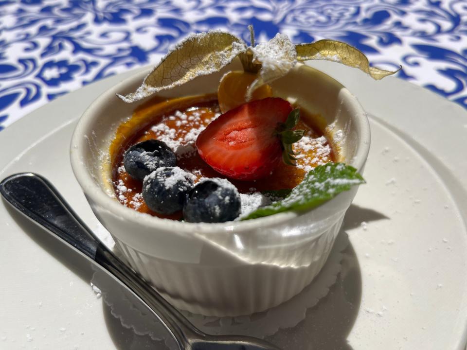 Creme brulee in white ramekin at Le Petit Chef