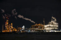 Portions of the LyondellBasell facility can be seen from an area east of Miller Cut Off Road in La Porte, Texas Tuesday, July 27, 2021. An explosion Tuesday evening killed two people at the facility and left several others injured. (Mark Mulligan/Houston Chronicle via AP)