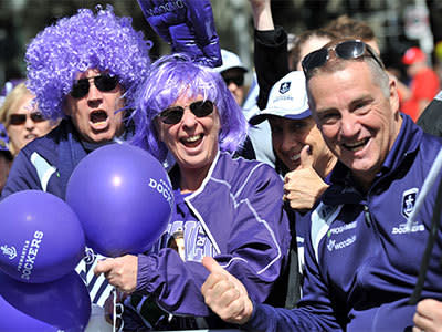 Fremantle Dockers supporters gather for the AFL Grand Final parade Collins Street in Melbourne, Friday, Sept. 27, 2013. Photo: AAP