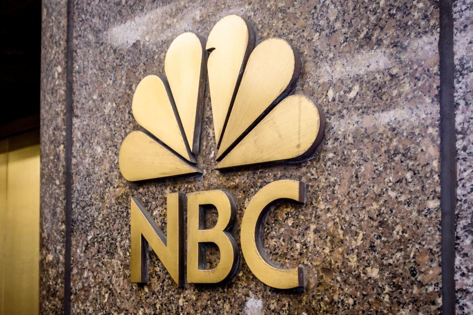 A golden version of the NBC logo