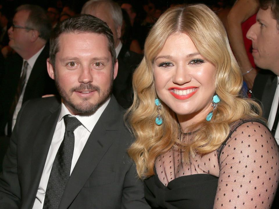 Kelly Clarkson (R) and Brandon Blackstock attend the 55th Annual GRAMMY Awards at STAPLES Center on February 10, 2013 in Los Angeles, California