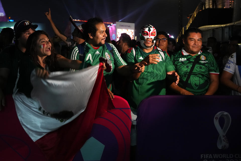 Fans wait in line for beer at a fan zone ahead of the FIFA World Cup, in Doha, Qatar Saturday, Nov. 19, 2022. (AP Photo/)