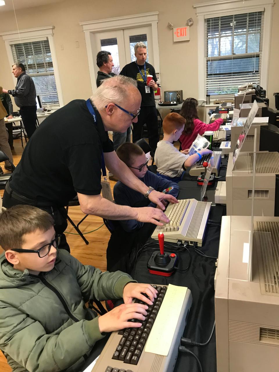 Under the guidance of Vintage Computer Society volunteers, 2023 NJ Makers Day attendees make music, draw and program on some of the first personal computers ever made at InfoAge Science & History Museums in Wall.