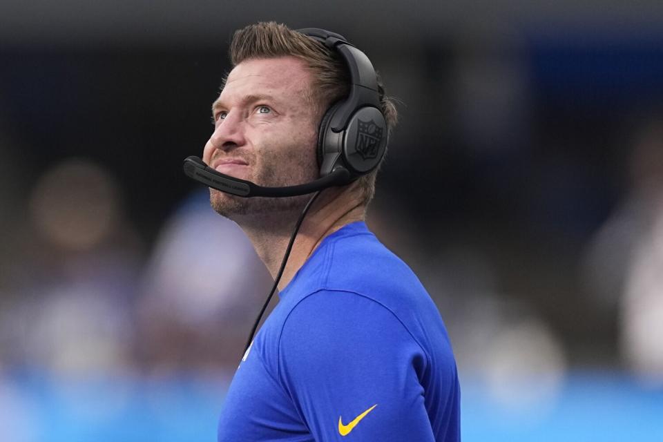 Rams coach Sean McVay glances toward the scoreboard.