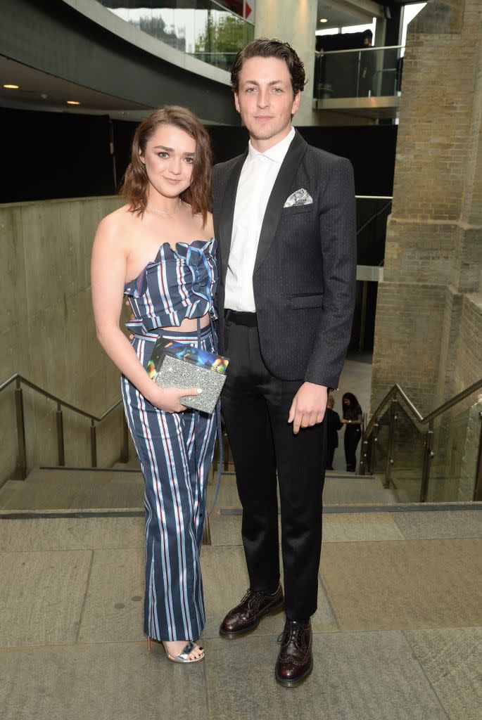 LONDON, ENGLAND - OCTOBER 18: Maisie Williams (L) and Ollie Jackson attend The Q Awards 2017, in association with Absolute Radio, at The Roundhouse