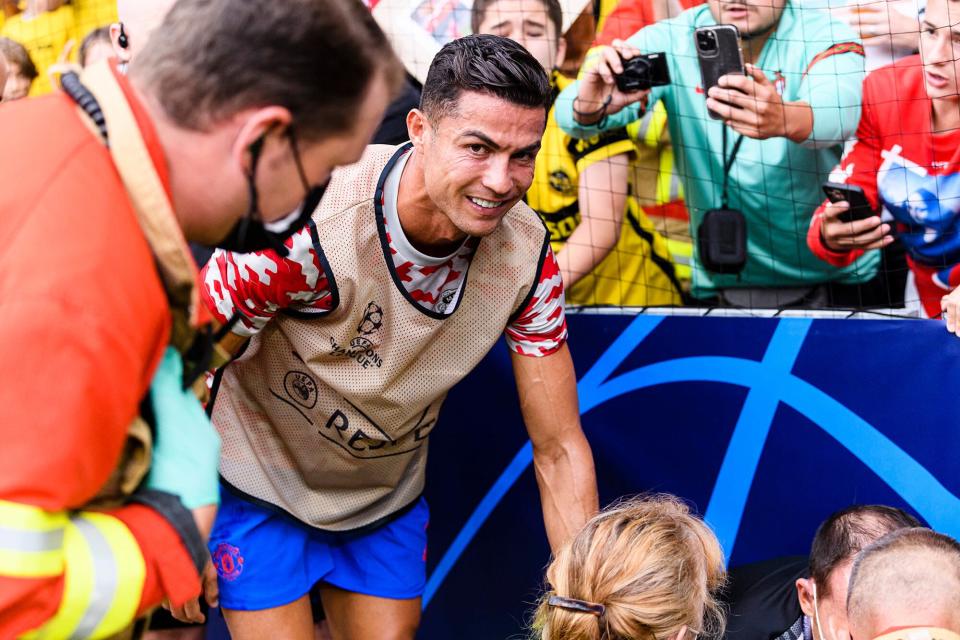 Cristiano Ronaldo Knocks Out Woman with Ball During Warmups, Gifts Her Jersey as Consolation image pic
