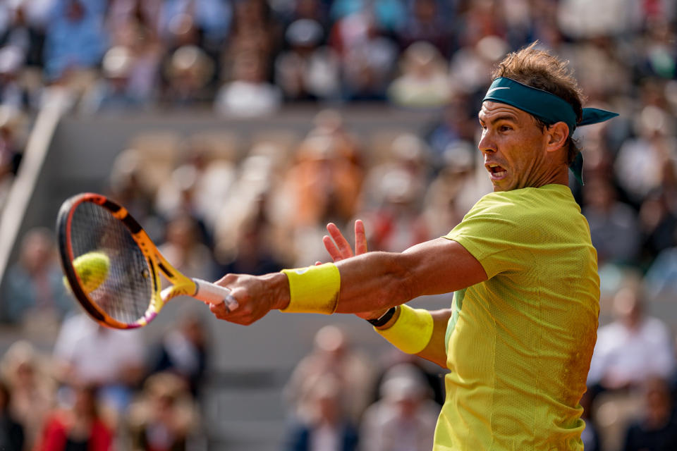 PARIS, FRANCE - MAY 29: Rafael Nadal of Spain plays a forehand against Felix Auger-Aliassime of Canada during the Men's Singles Fourth Round match on Day 8 of The 2022 French Open at Roland Garros on May 29, 2022 in Paris, France. (Photo by Andy Cheung/Getty Images)