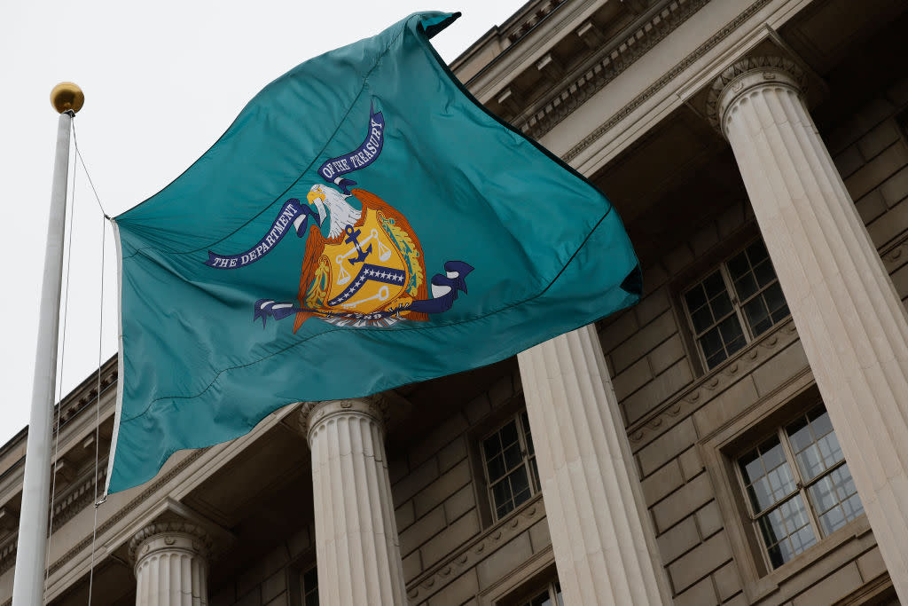  A flag with the seal of the Treasury Department flies outside the headquarters of the Internal Revenue Service. 
