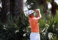 Feb 26, 2017; Palm Beach Gardens, FL, USA; Rickie Fowler tees off on the second hole during the final round of The Honda Classic at PGA National (Champion). Mandatory Credit: Jason Getz-USA TODAY Sports