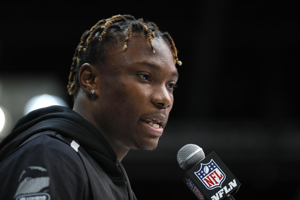 Alabama wide receiver Henry Ruggs III speaks during a press conference at the NFL football scouting combine in Indianapolis, Tuesday, Feb. 25, 2020. (AP Photo/Charlie Neibergall)