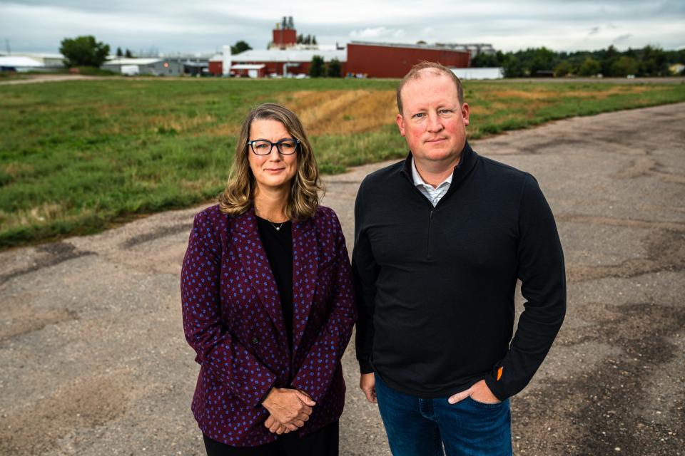 Kristin Candella, CEO of Fort Collins Habitat for Humanity, and Patrick McMeekin, president of land for Hartford Homes, are photographed at the site of a joint project behind Odell Brewing Co. on Monday, Sept. 11, 2023, in Fort Collins. The city has proposed raising the water supply requirement fee, which developers and housing advocates contend will drive up prices for new homes.