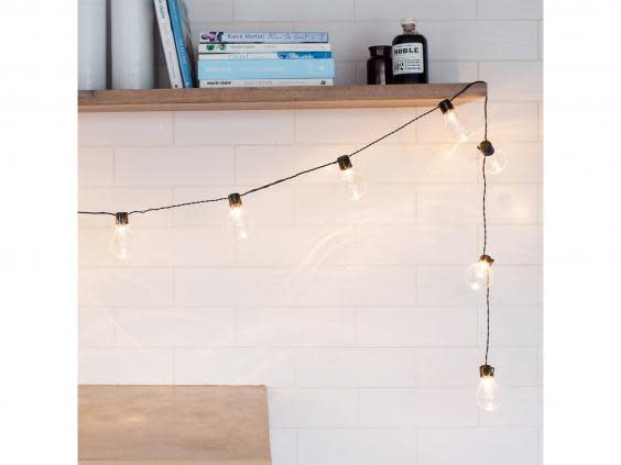 Brighten up your bed frame with these clear bulb fairy lights that add a retro feel (Not On The High Street)