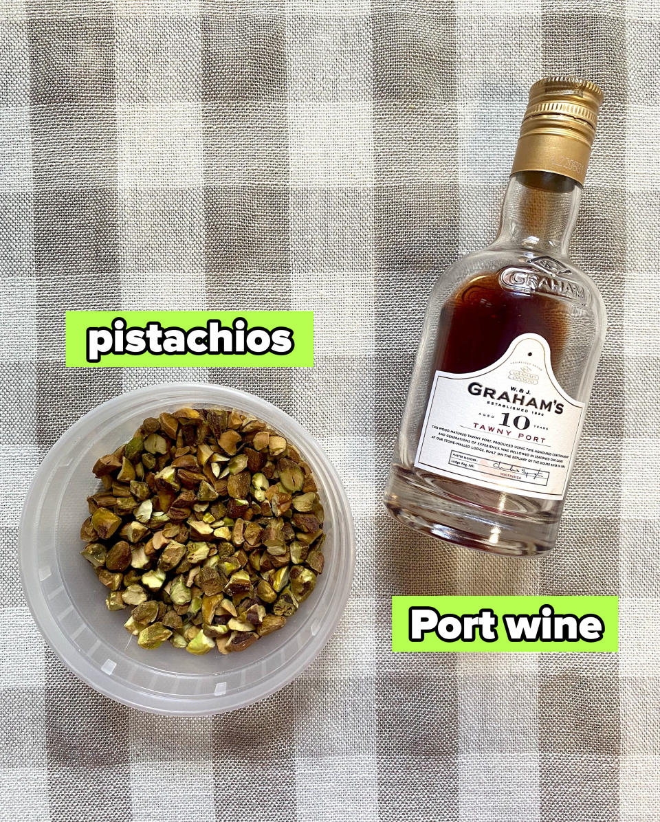 pistachios and a bottle of Port on a table