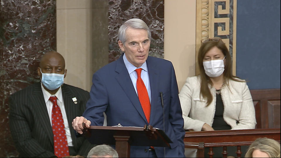 In this image from video, Sen. Rob Portman, R-Ohio, speaks as the Senate reconvenes to debate the objection to confirm the Electoral College Vote from Arizona, after protesters stormed into the U.S. Capitol on Wednesday, Jan. 6, 2021. (Senate Television via AP)