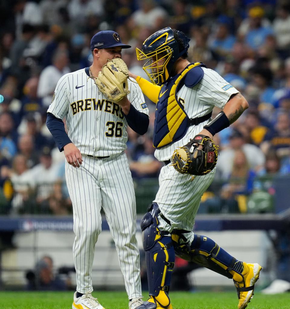 Mound visit by Milwaukee Brewers starting pitcher Tobias Myers (36) and Milwaukee Brewers catcher Gary Sánchez (99) during the third inning of Game 3 of National League wild-card series on Thursday October 3, 2024 at American Family Field in Milwaukee, Wis.