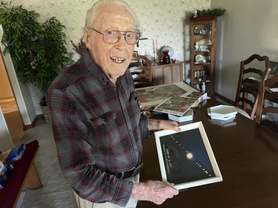 105-year-old Laverne Biser has been chasing eclipses since 1963. He shares a photo he took of his favorite eclipse in 1979 in Williston, South Dakota. / Credit: CBS News Texas