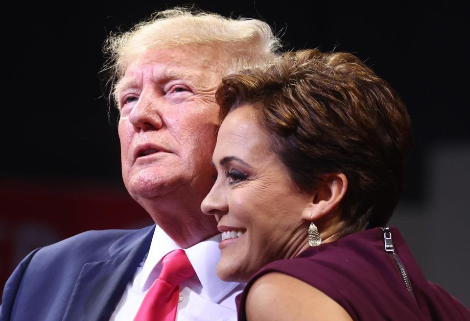 Former President Donald Trump and Arizona gubernatorial candidate Kari Lake at a Republican campaign rally on July 22, 2022, in Prescott Valley.
