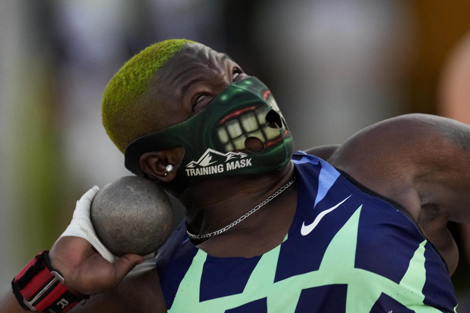 Raven Saunders competes during the finals of the women's shot put at the U.S. Olympic Track and Field Trials Thursday, June 24, 2021, in Eugene, Ore. (AP Photo/Charlie Riedel)