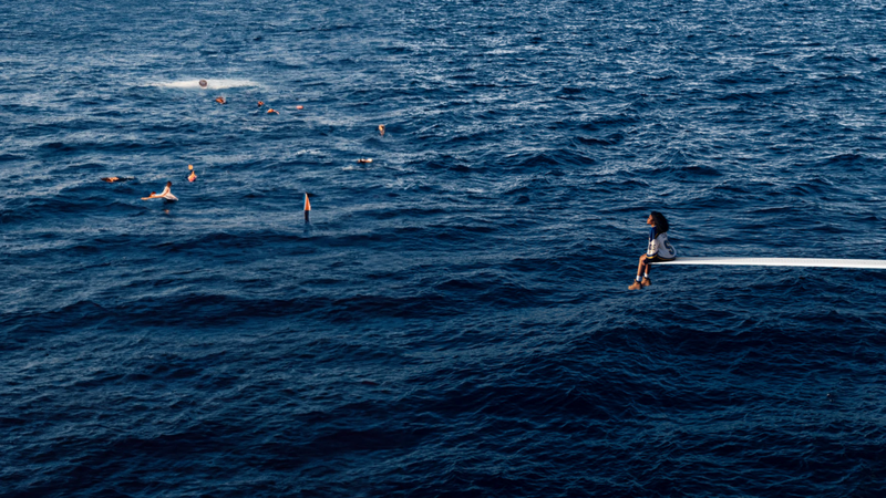 Expanding SZA’s SOS album cover cheapens the theme of the album, as AI placing people in the water undermines the artist’s attempt at capturing her own loneliness.