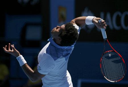 Jo-Wilfried Tsonga of France serves during his men's singles match against Filippo Volandri of Italy at the Australian Open 2014 tennis tournament in Melbourne January 14, 2014. REUTERS/David Gray