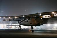 Solar Impulse 2, a solar powered plane, lands at an airport in Abu Dhabi, United Arab Emirates July 26, 2016. REUTERS/Stringer