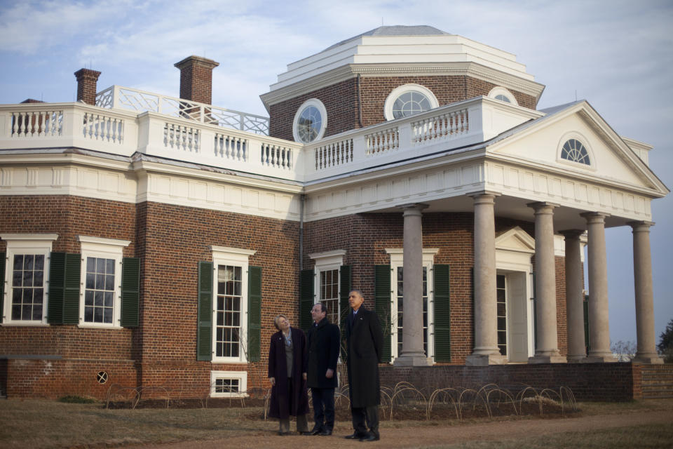 President Barack Obama, right, and French President Francois Hollande, center, tour the grounds of Monticello, President Thomas Jefferson's estate, Monday, Feb. 10, 2014, in Charlottesville, Va. Leading the tour is Leslie Bowman, far left, President, Thomas Jefferson Foundation. (AP Photo/Pablo Martinez Monsivais)