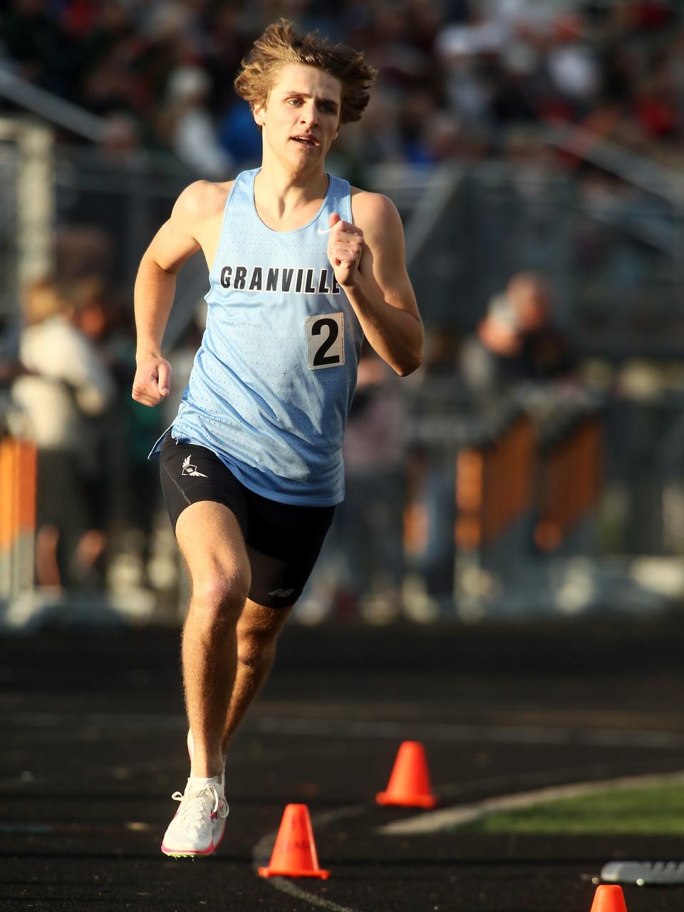 Granville's Cohen Stump pulls away to win the Buckeye Division 1,600 meters during the Licking County League championships at Heath on Friday, May 10, 2024.
