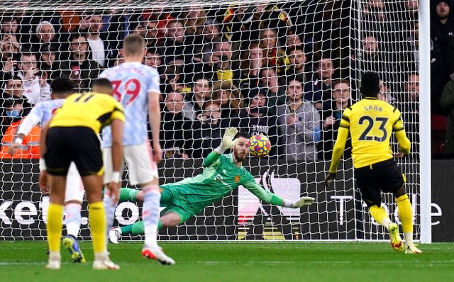 Manchester United goalkeeper David de Gea saves Ismaila Sarr's retaken penalty