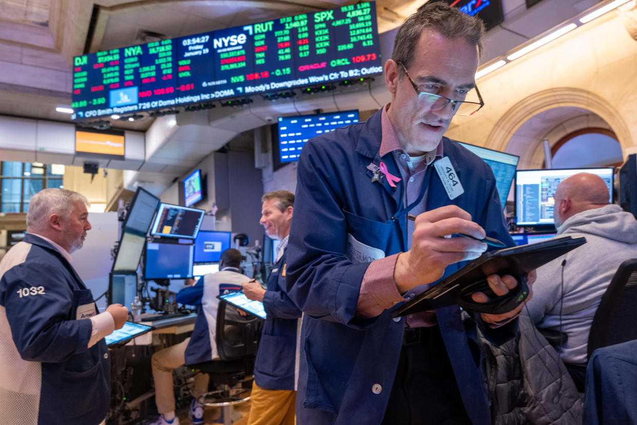 NEW YORK, NEW YORK - JANUARY 19: Traders work on the floor of the New York Stock Exchange (NYSE) on January 19, 2024 in New York City. Stocks closed up over 350 points while the S&P 500 closed at an all-time high on Friday. (Photo by Spencer Platt/Getty Images)