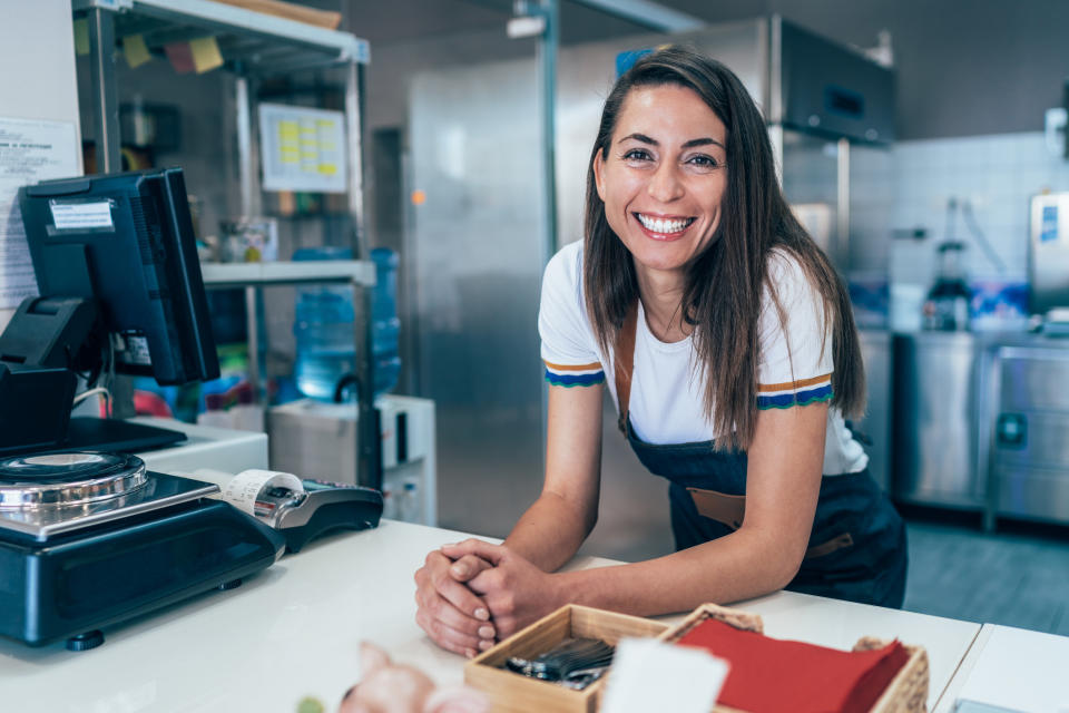 A restaurant cashier ready to take an order