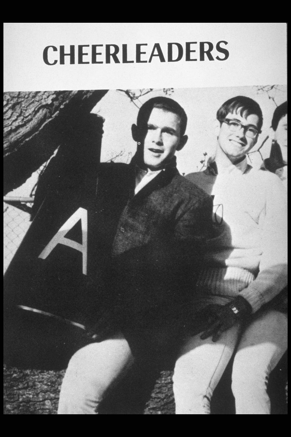 George W. Bush in his yearbook posing with other cheerleaders