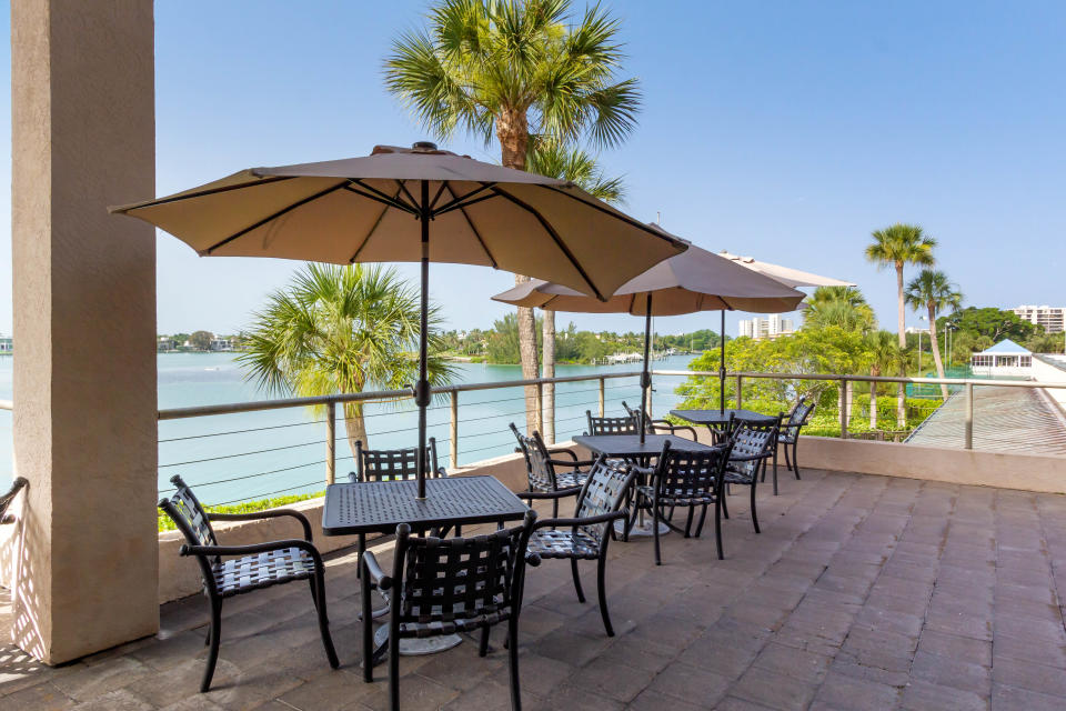 Chart House's Longboat Key location offers guests views of the New Pass area from both the terrace and indoor dining room.